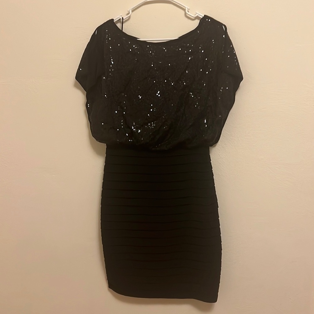 Black formal dress. Top is blousy sequins